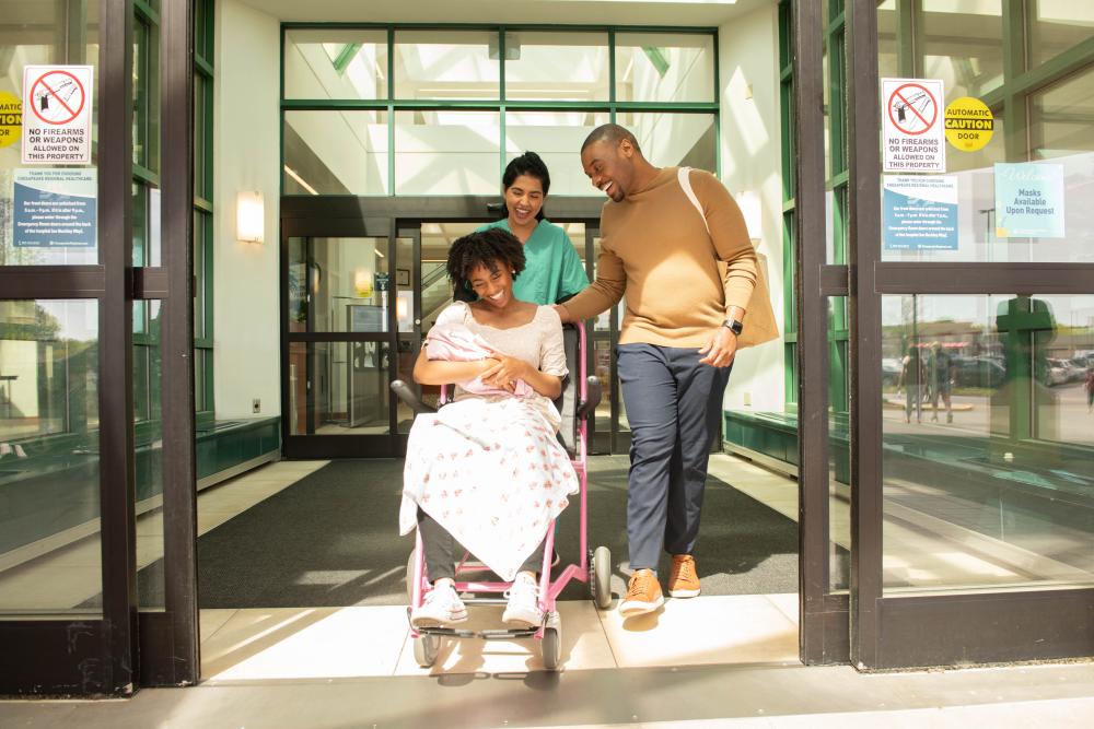 family with baby in wheelchair